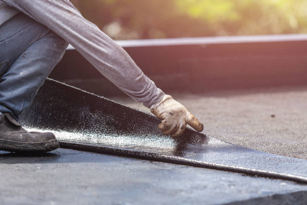 Professional Basement Waterproofing technician working in Sharpsburg, GA